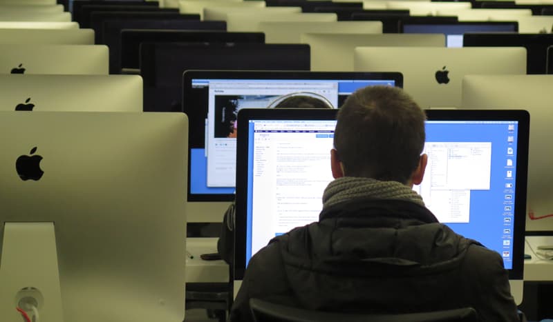 man in front of computer