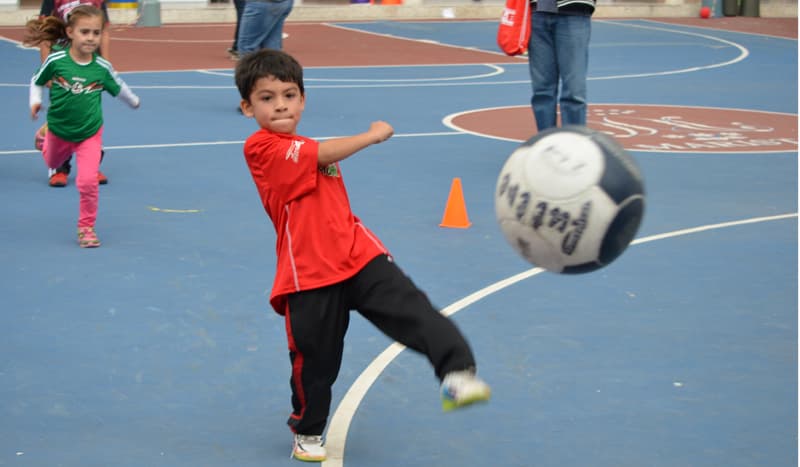 boy playing football